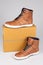 Royal enfield brown motorbike shoes front of box high top motorcycle sneakers in