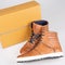 royal enfield brown shoes front of box high top motorcycle sneakers motorbike in