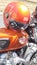 Royal Enfield old school motorcycle orange color with engine motor detail and