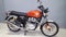 Royal Enfield side new motorcycle from India orange crush retro motorbike vintage