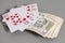 Royal Flush Playing Cards and Indian Currency Rupee bank notes