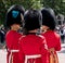 Royal Guard soldiers having an intimate conversation during the Trooping the Colour military ceremony, held once a year in London