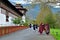 Royal guards and Buddhist priests near the walls of Tashichho Dzong monastery