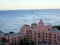 The Royal Hawaiian and boats in the ocean off Waikiki