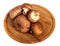 Royal large champignon on a wooden chopping round board. on a white