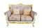 Royal sofa with pillows in beige luxurious interior .