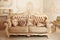 Royal sofa with pillows in beige luxurious interior with ornament frame wall