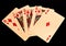 Royal straight flush playing golden cards poker hand in diamonds