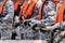 Royal Thai Navy sailors in camouflage pattern uniform with life vest pull the manila rope during replenishment at sea exercise