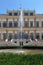 Royal villa with fountain and italian flag in monza city in italy