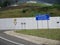 Roza Khutor / Russia - August 2019:, Mountain road in Caucasus mountains. Road sign