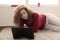 Rred-haired girl with a laptop