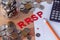 `RRSP` Registered Retirement Savings Plan signs with coins in the background