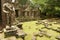 Rruins of the Preah Khan Temple with the beheaded state in Siem Reap, Cambodia.