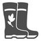 Rubber boots for garden with flower and leaf solid icon, gardening concept, rain boots vector sign on white background