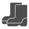Rubber boots solid icon, farm garden concept, Rain boots sign on white background, Waterproof shoes icon in glyph style