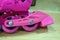 Rubber brake of pink childrens roller skates. Roller skates for outdoor sports. Healthy lifestyle baby