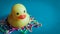 Rubber duck surrounded by colorful rubber bands