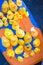 Rubber duckies in a group on a blue raft