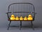 Rubber ducks on chair