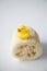 Rubber ducky on loofah