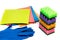 Rubber gloves, cellulose sponges, stack of cleaning sponges ready for household cleaning tasks