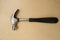 rubber-handled hammer with nail puller, round head for fine work, manual universal percussion tool for driving and extracting