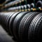 Rubber inventory Close up of bulk car tires in store, tire shop backdrop