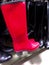 Rubber red women boots with heels. For rain and wet autumn weather. Protect feet from water. Sold in store