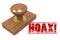 Rubber stamp with word Hoax