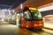 Rubber-tyred tram type Translohr at Piazzale Roma public transport at night in Venice, Italy