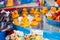 Rubber yellow ducks with hooks in their heads. Fairground hook a rubber duck chance game