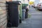 Rubbish bins and recycling bins outside homes on a n english street