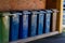 Rubbish bins with Stafford Borough Council logo on it. The green general waste, blue for recycling, and brown for compost and gard