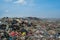 Rubbish dump zone view full of smoke, litter, plastic bottles,garbage and trash at the Thilafushi local tropical island