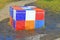 Rubik`s Cube on the children`s Alice in Wonderland playground in Picturesque Alley