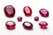 Ruby gemstone collection on white background