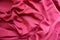 Ruby red cotton fabric in soft folds