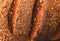 Ruddy crust of bread as an abstract background. Texture