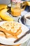 Ruddy toast with peanut butter, sliced â€‹â€‹bananas, coffee, br