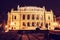 Rudolfinum - Czech philharmonic in Prague, Czech republic. Night scene. Travel destination. Architectural scene. Red photo filter