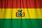 Ruffled Flag of Bolivia Blowing in Wind