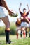 Rugby, closeup and man with a ball in hand outdoor on a pitch for teamwork, target and score. Male athlete team playing