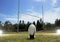 Rugby football positioned in front of the goal posts.