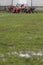Rugby scrum on muddy field