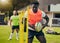 Rugby, sports and black man training with equipment ready for match, practice and sport game. Fitness, performance and