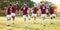 Rugby, sports and stretching with a team getting ready for training or a competitive game on a field. Fitness, sport and