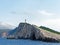 Rugged Greek Island Coastline With a Lighthouse, Greece