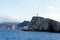 Rugged Greek Island Coastline With a Lighthouse, Greece