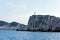 Rugged Greek Island Coastline With a Lighthouse, Greece